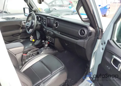 2023 Jeep Wrangler 4Xe Sahara 4X4 from USA, damaged, VIN 1C4JJXP68PW557962